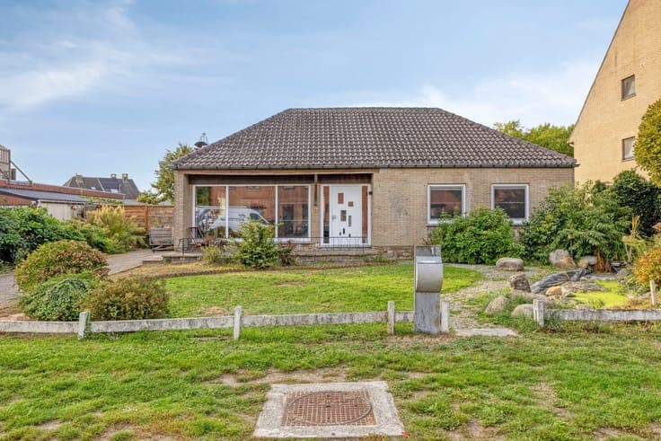 Gelijkvloerse woning met 3 slaapkamers, garage en zuidwes...