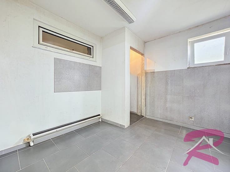 MAISON DE COMMERCE - RDC COMMERCIAL ET APPARTEMENT 1ER