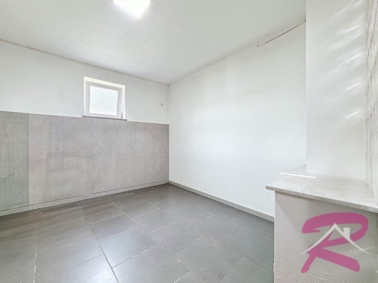 MAISON DE COMMERCE - RDC COMMERCIAL ET APPARTEMENT 1ER
