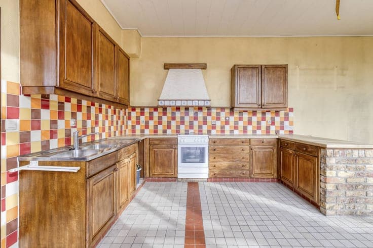 Three-bedroom house for sale with a sunny garden.