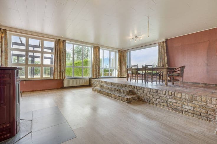 Three-bedroom house for sale with a sunny garden.