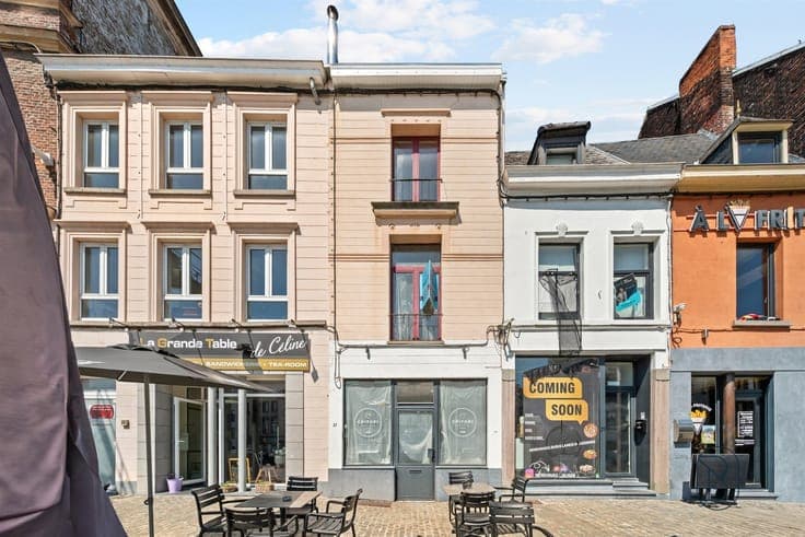 Commercial premises + residential unit on the main square of
