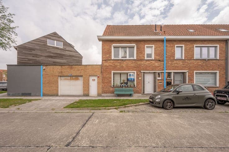 Instapklare rijwoning met garage, 3 slaapkamers en buiten...