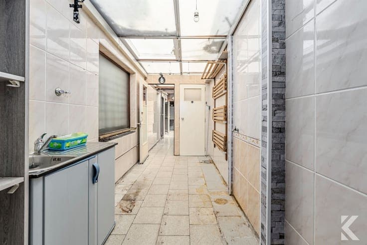 A home in need of renovation with great potential and a spac