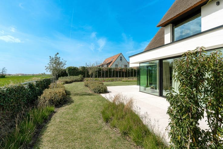 Luxury villa for sale in Knokke with open views over the fie