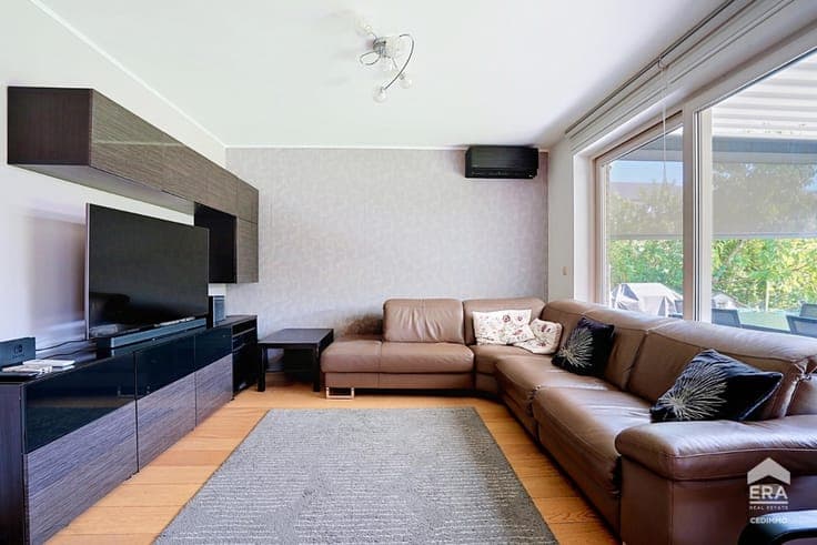 STUNNING THREE-SIDED SEMI-DETACHED HOME WITH A SEPARATE PROF