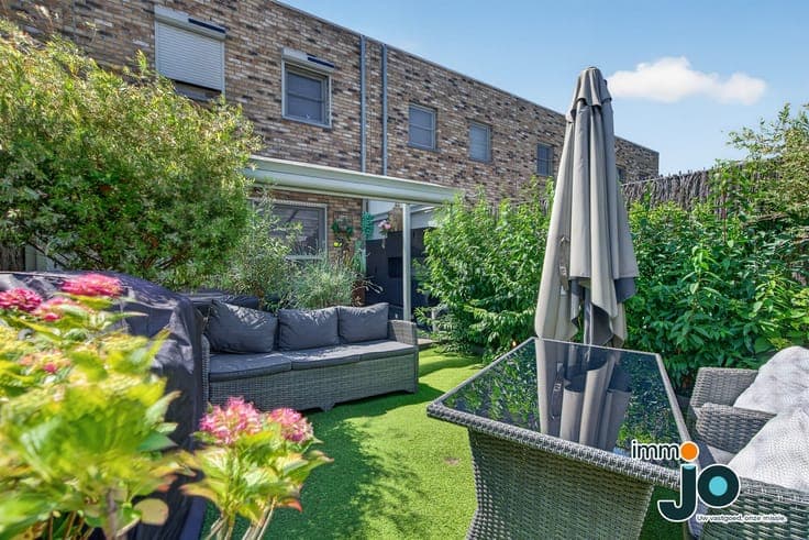 A modern, move-in-ready two-bedroom house with a lovely g...