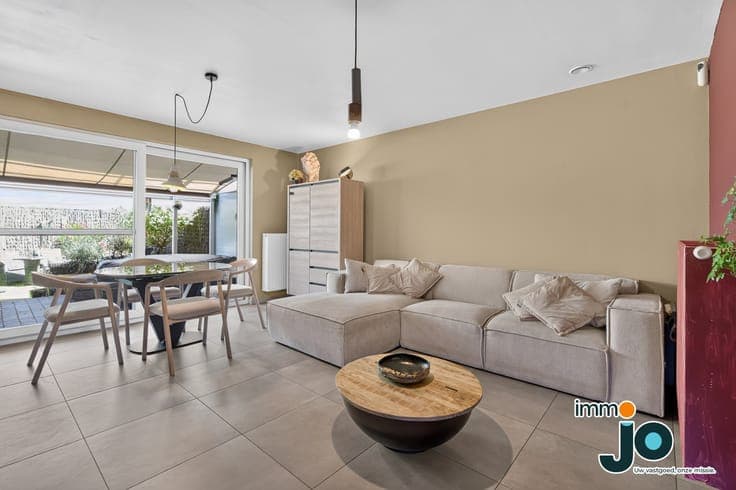 A modern, move-in-ready two-bedroom house with a lovely g...