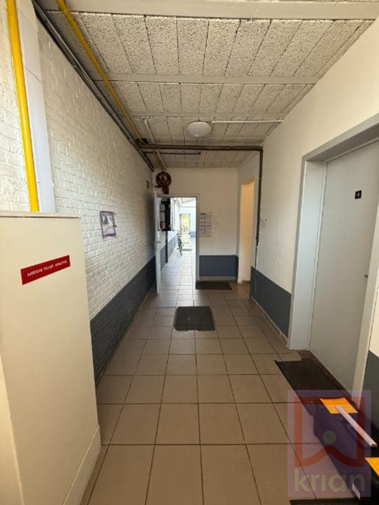 Gebouw met 11 kamerwoningen, centrum Geel op 8a66.