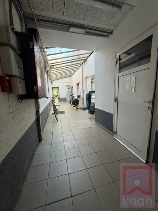 Gebouw met 11 kamerwoningen, centrum Geel op 8a66.