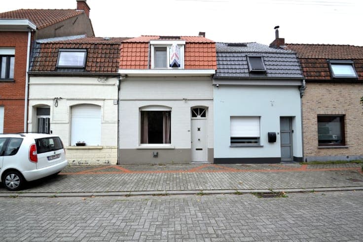 Charmante gezinswoning met uitweg achteraan op een toploc...