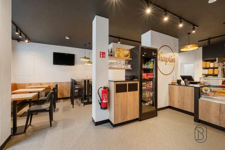 Prime-location chip shop and move-in-ready duplex apartment