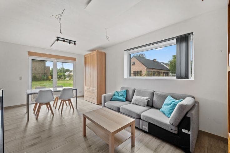 Modern single-family home with spacious garage and garden