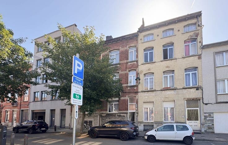 Investment property with 2 registered units and a garden