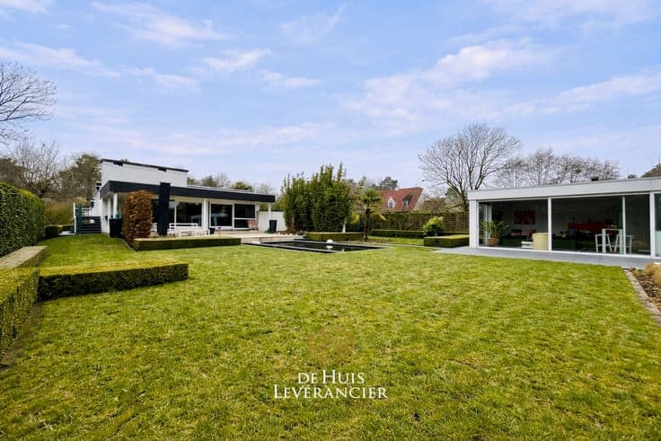 Elegante laagbouwvilla waar discrete rust, moderne uitstr...