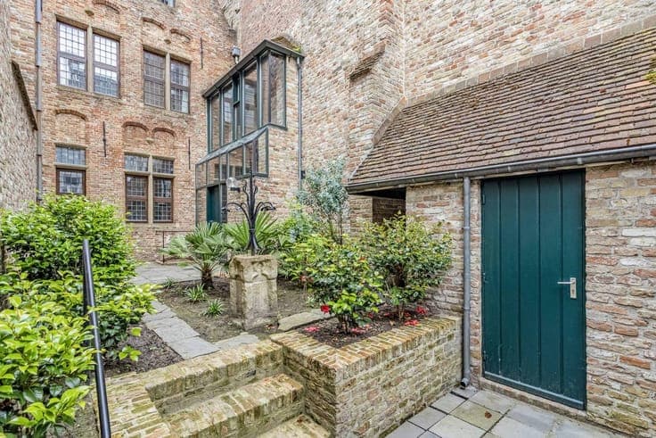 Charming mansion with wooden façade for sale in Bruges