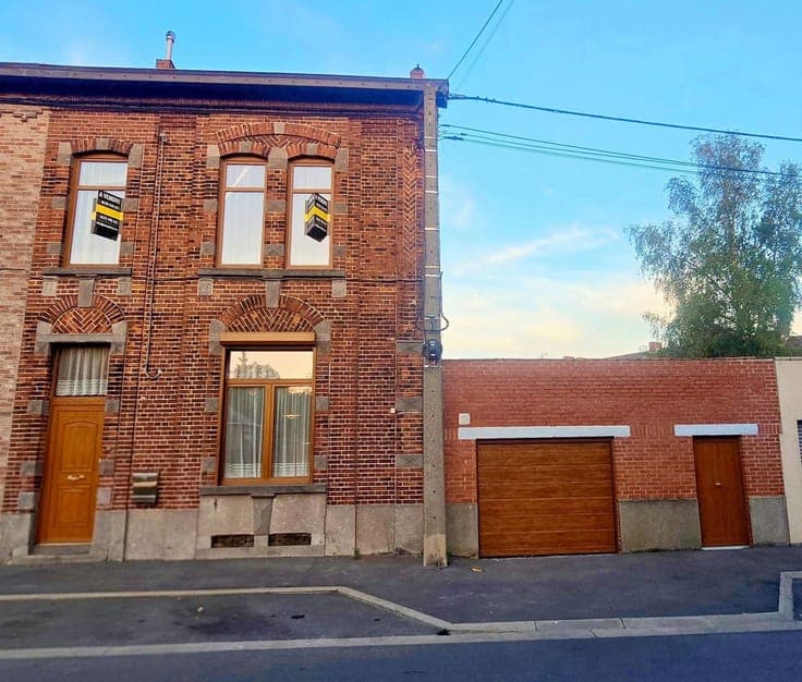 Stunning house full of character with a garage and garden