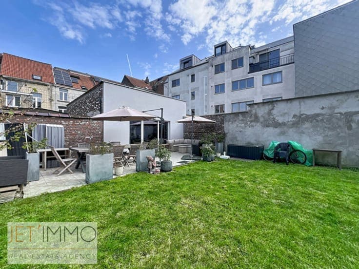 Beautiful two-family home or investment property with a gard