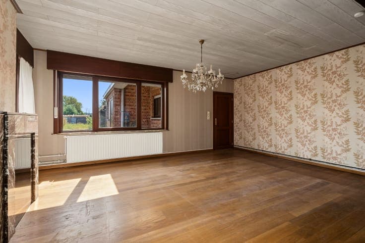 Halfopen bebouwing met achterliggend weiland