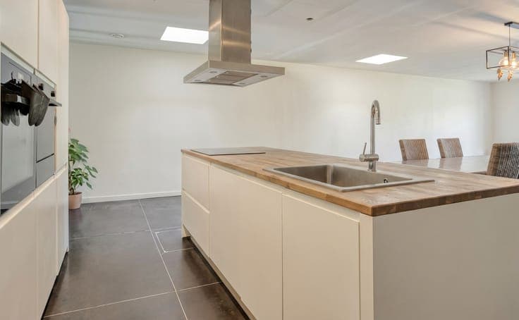 Instapklare en energiezuinige tussenwoning met 5 slaapkam...