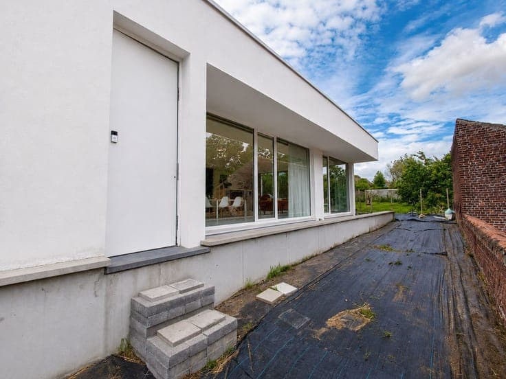 Architecturale villa met praktijkruimte, 5 slaapkamers en...