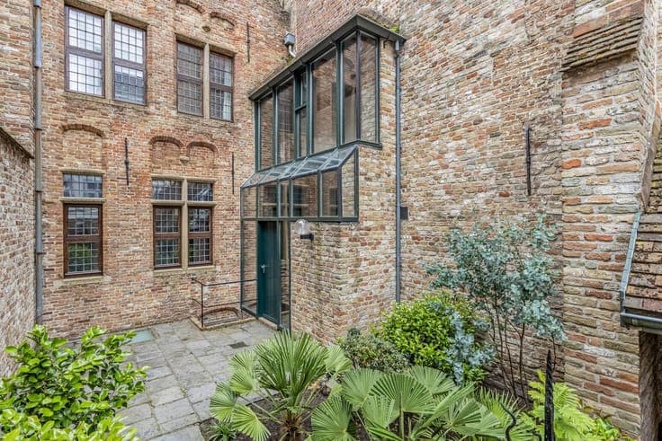 Charming mansion with wooden façade for sale in Bruges