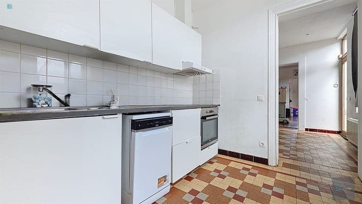 Maison 3 façades avec passage latéral
