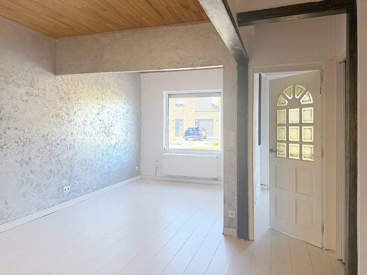 Rijwoning met 3 slaapkamers en uitweg