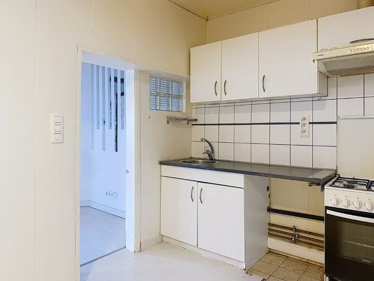 Rijwoning met 3 slaapkamers en uitweg