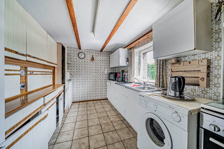 Maison individuelle avec 4 chambres et un grand terrain