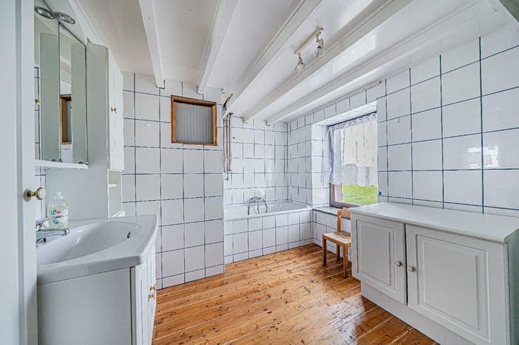 Maison individuelle avec 4 chambres et un grand terrain