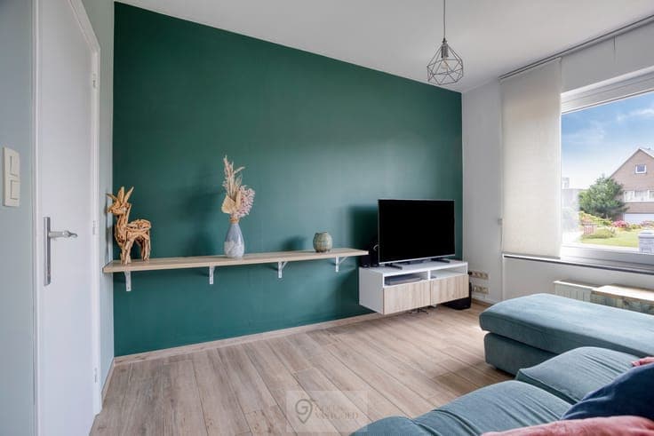 Instapklare gezinswoning, garage en prachtige tuin
