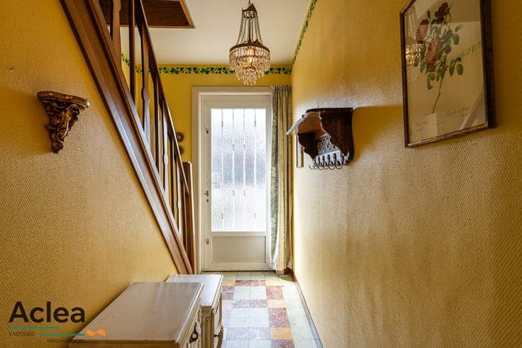 Te renoveren halfopen bebouwing op mooi perceel van 444m²