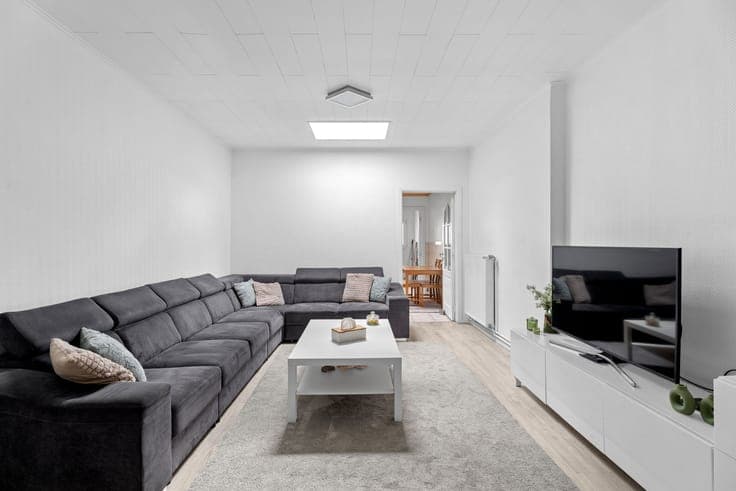 Surprisingly spacious home with unique rear access!