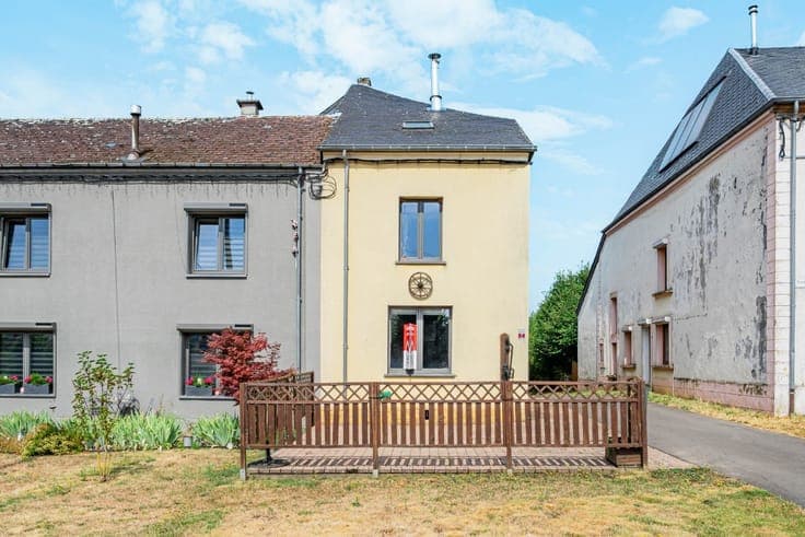 3-bedroom house with double garage and great potential.