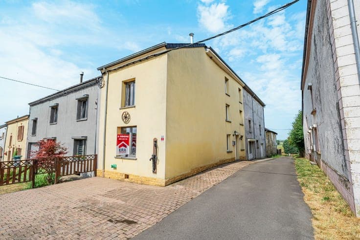3-bedroom house with double garage and great potential.