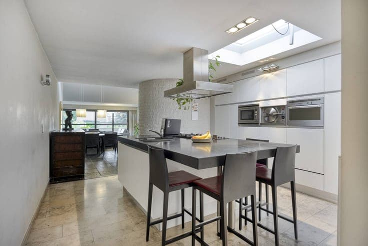 Spacious townhouse with commercial space for sale in Maaseik