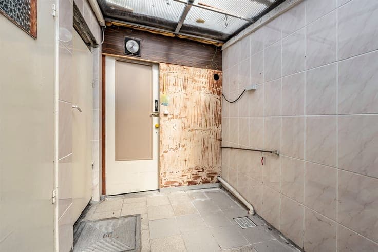 A home in need of renovation with great potential and a spac