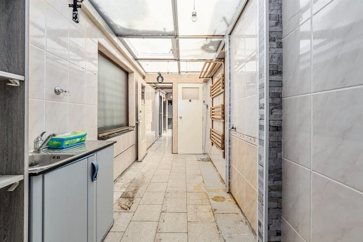 A home in need of renovation with great potential and a spac