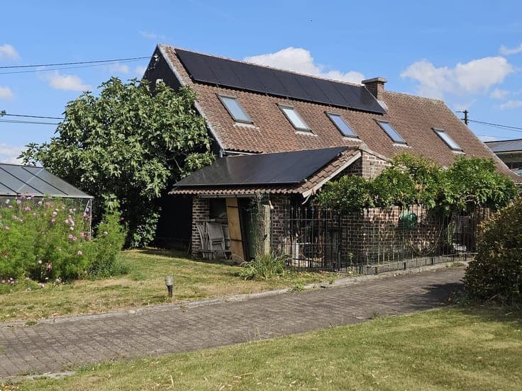 Charmante woning in hoevestijl op een perceel van 32a75ca