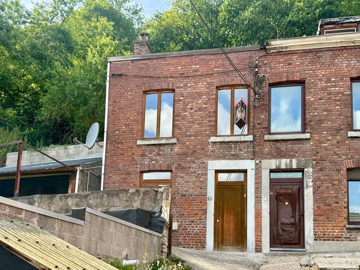 Maison unifamiliale divisée en deux logements