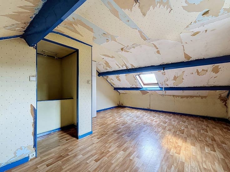 Maison unifamiliale divisée en deux logements