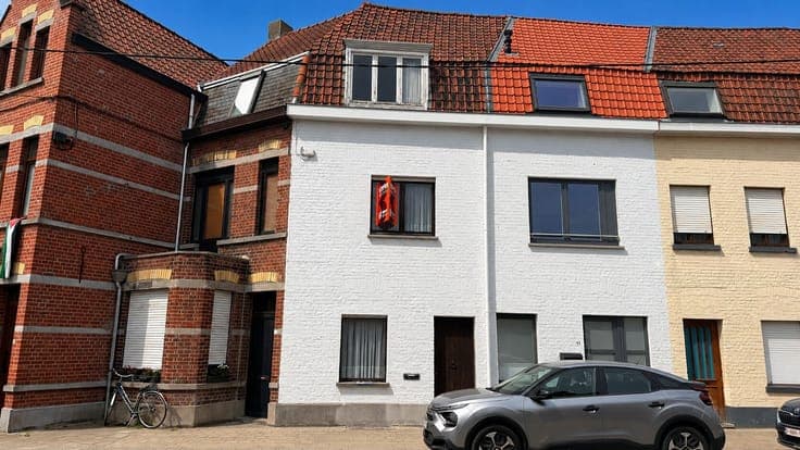 Renovation property with deep garden near Kortrijk center