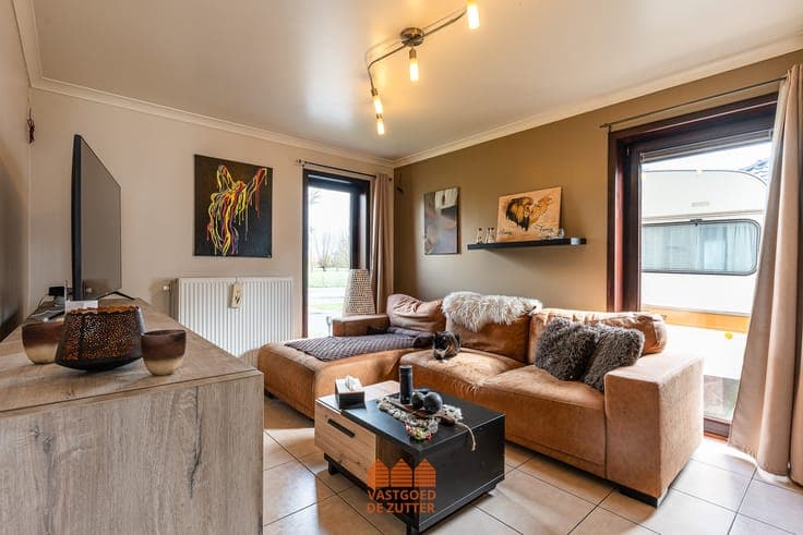Halfopen bebouwing met 3 slaapkamers, zonnige tuin en EPC A