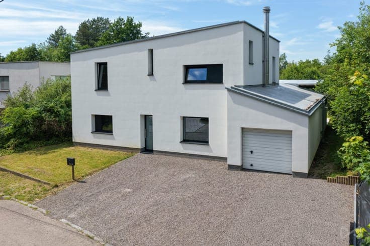 A modern family home with a garden.