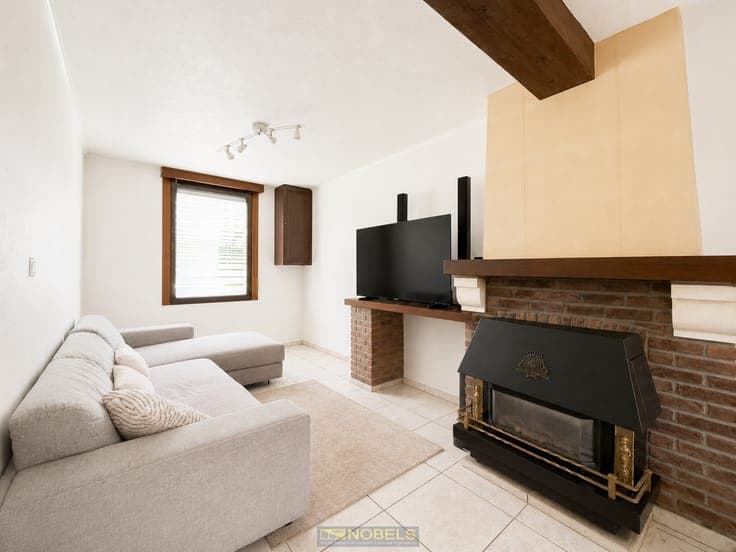 Te koop, te renoveren woning met diepe tuin te Ronse