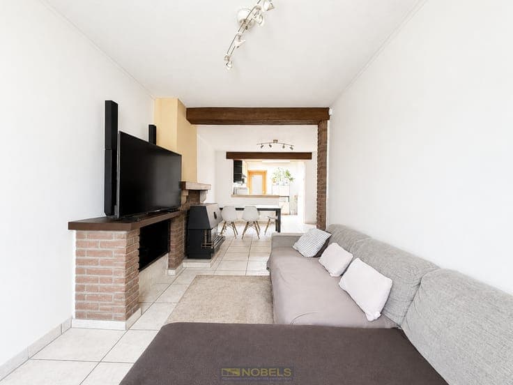 Te koop, te renoveren woning met diepe tuin te Ronse