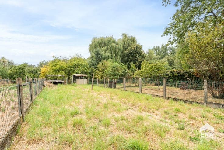 Solid home with 4 bedrooms, garage and garden near Aalst