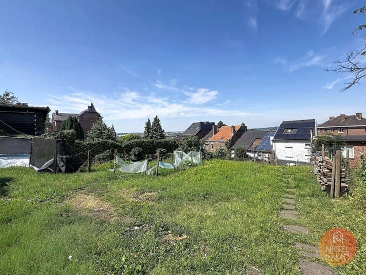 🏡 Pépite à Visé : 4 chambres + 4 garages en plein centre !