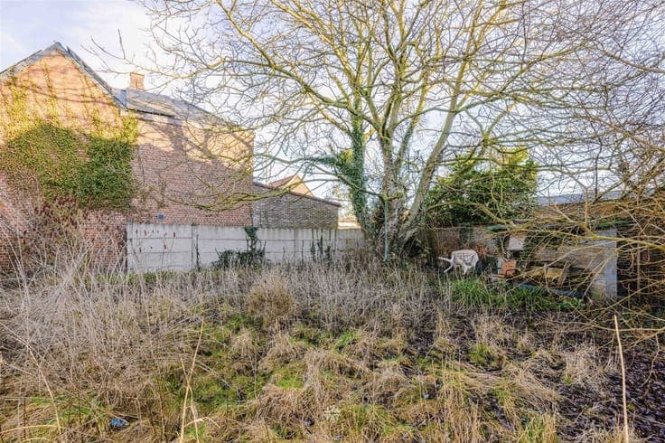 Dubbele woning met enorm renovatie- en investeringspotentiee